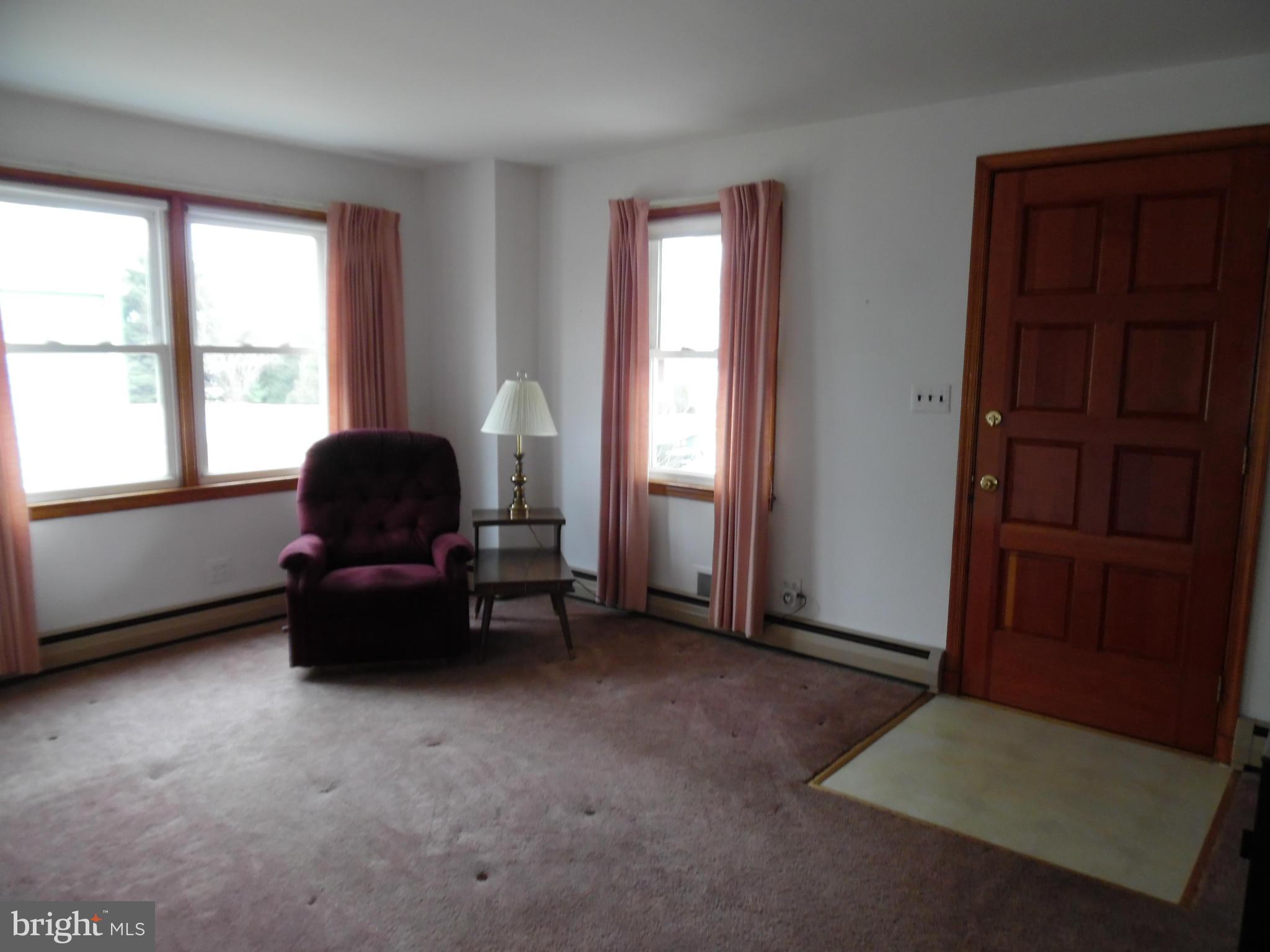 1800 Forrest Road Baltimore, MD 21234 - Photo 3 of 17 a living room with furniture and a window