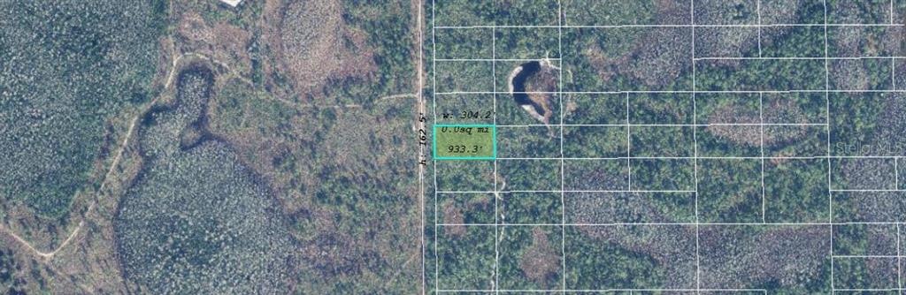 753 Dill Road Christmas, FL 32709 - Photo 3 of 4 a bathroom with a shower and a sink