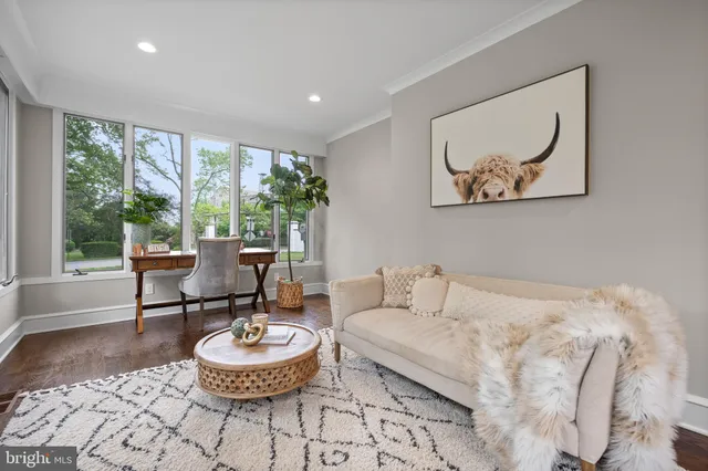 a view of room with furniture and wooden floor