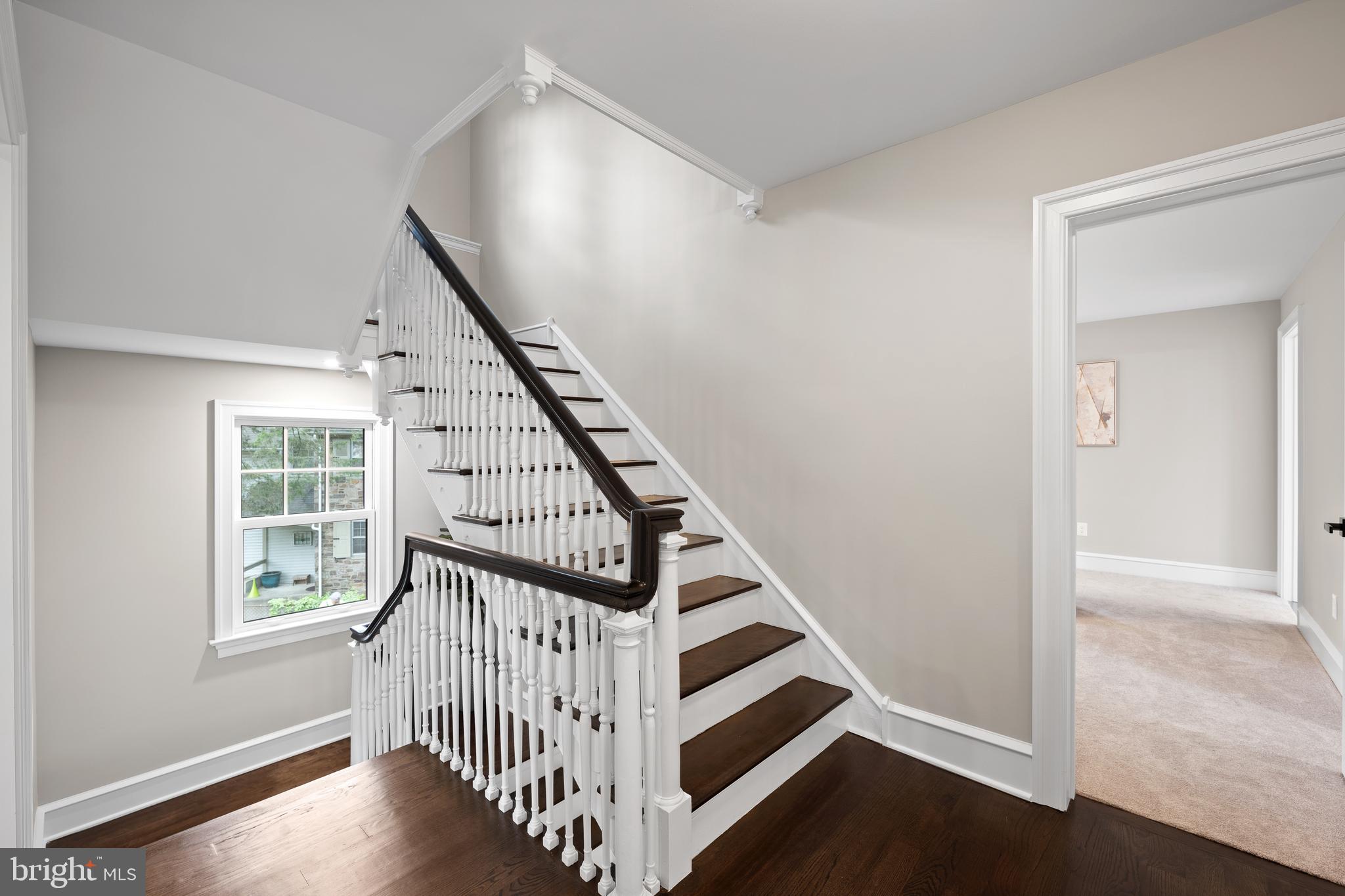 200 Hilldale Road, Unit 1 Villanova, PA 19085 - Photo 25 of 58 a view of entryway with wooden floor and stairs