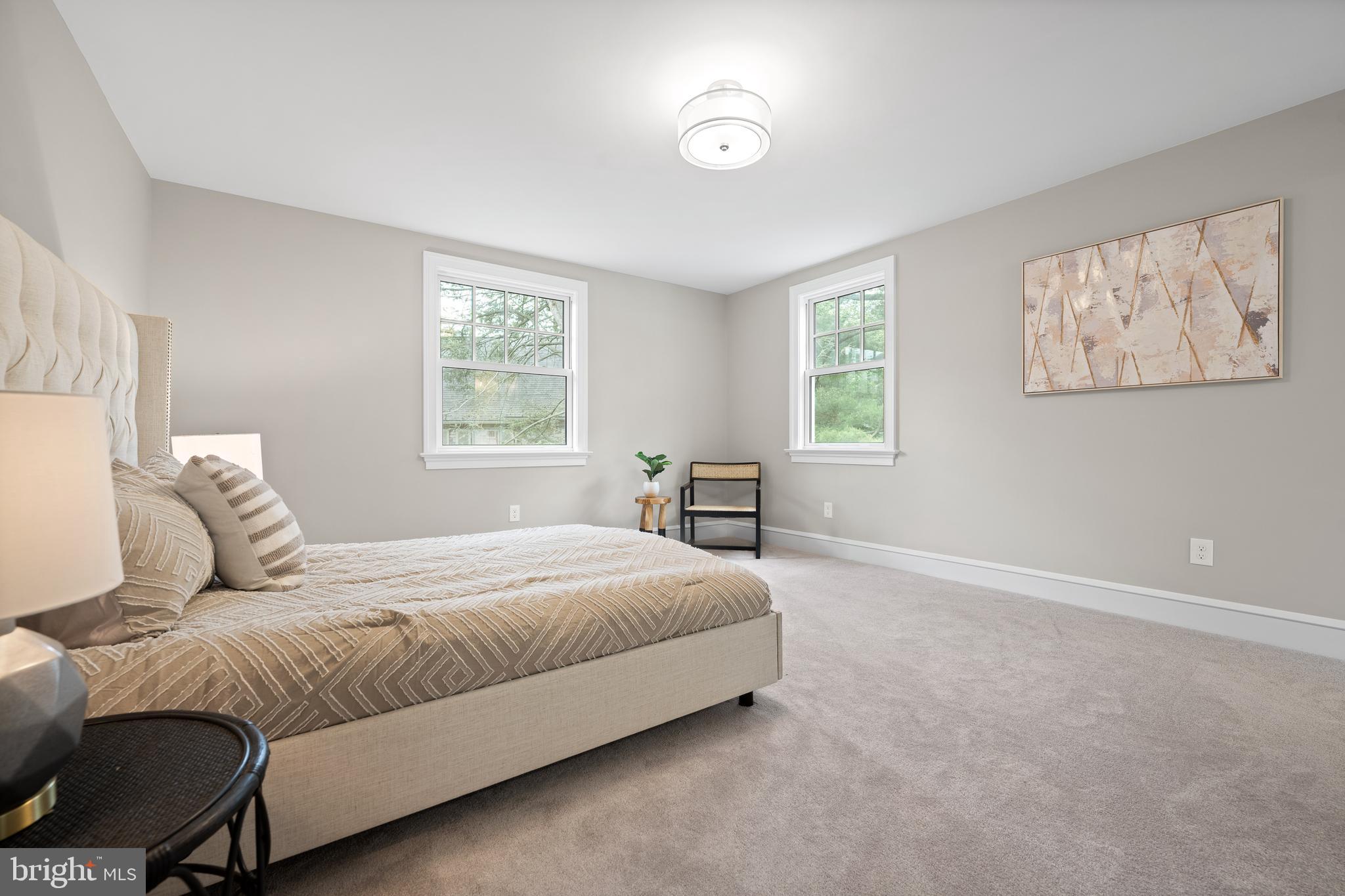 200 Hilldale Road, Unit 1 Villanova, PA 19085 - Photo 27 of 58 a bedroom with a bed and a window