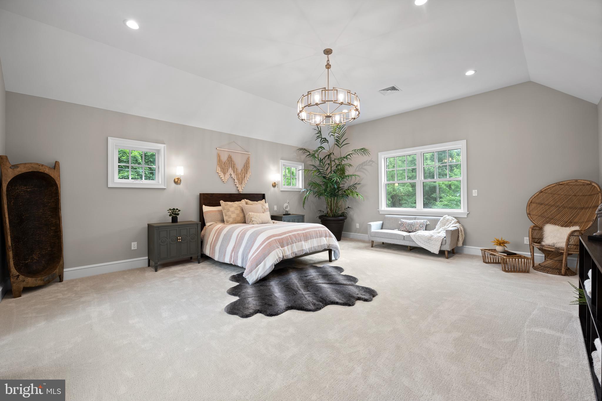 200 Hilldale Road, Unit 1 Villanova, PA 19085 - Photo 32 of 58 a spacious bedroom with a bed and a large window