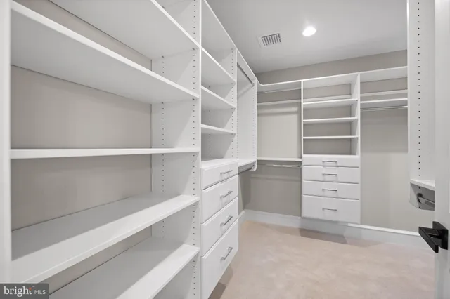 a view of a hallway with a window