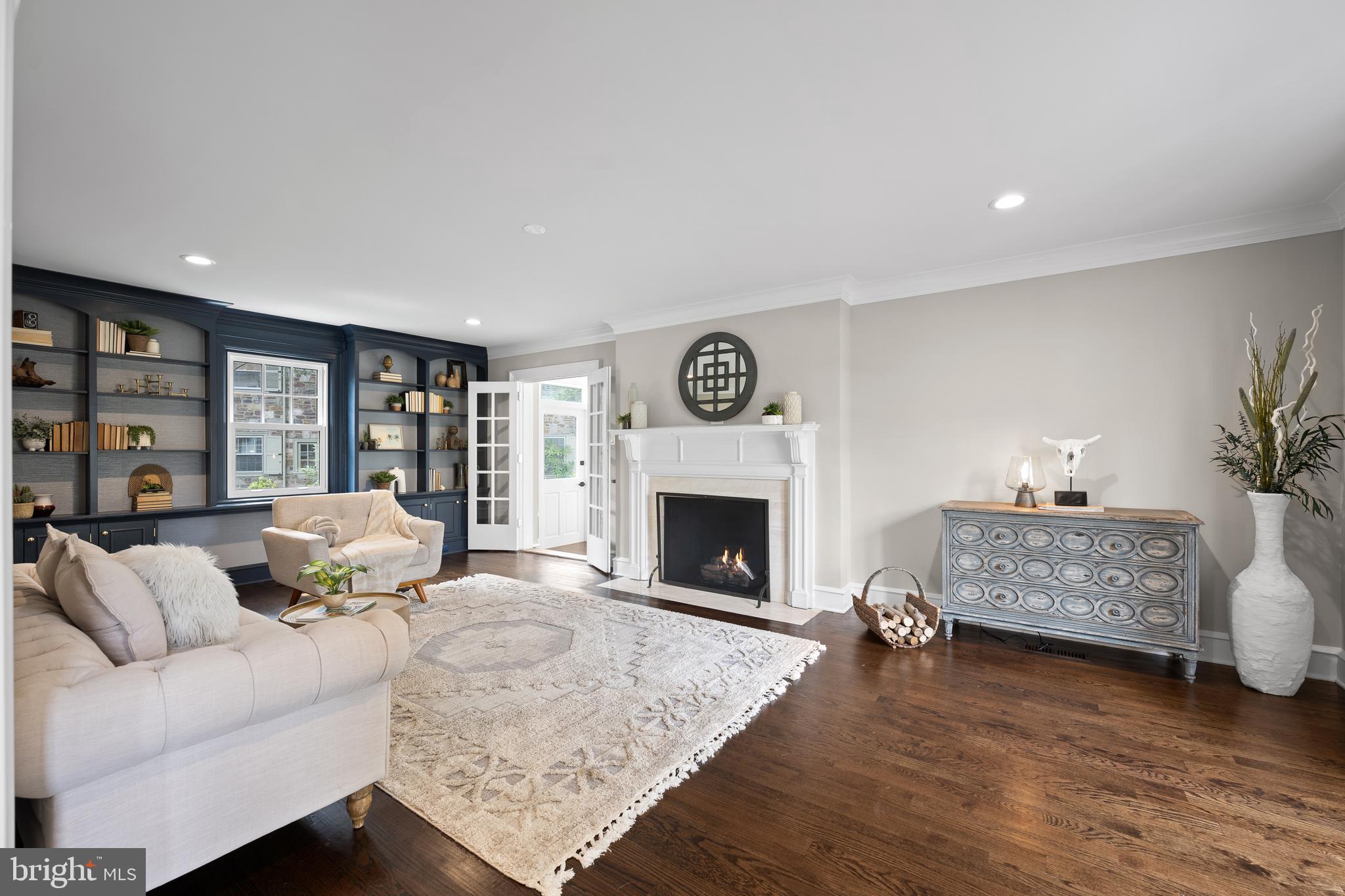 200 Hilldale Road, Unit 1 Villanova, PA 19085 - Photo 4 of 58 a living room with furniture and a fireplace