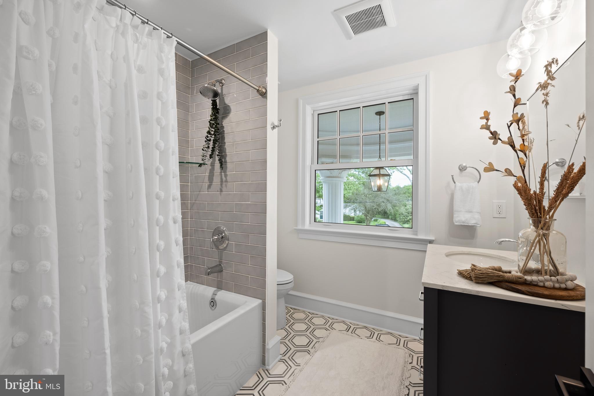 200 Hilldale Road, Unit 1 Villanova, PA 19085 - Photo 41 of 58 a bathroom with a bathtub and a shower