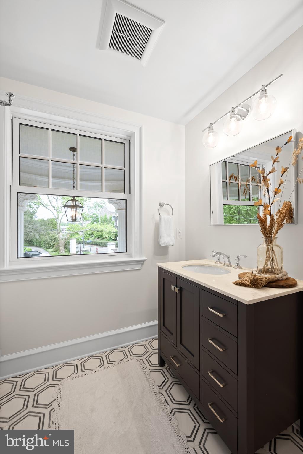 200 Hilldale Road, Unit 1 Villanova, PA 19085 - Photo 42 of 58 a bathroom with a sink and mirror
