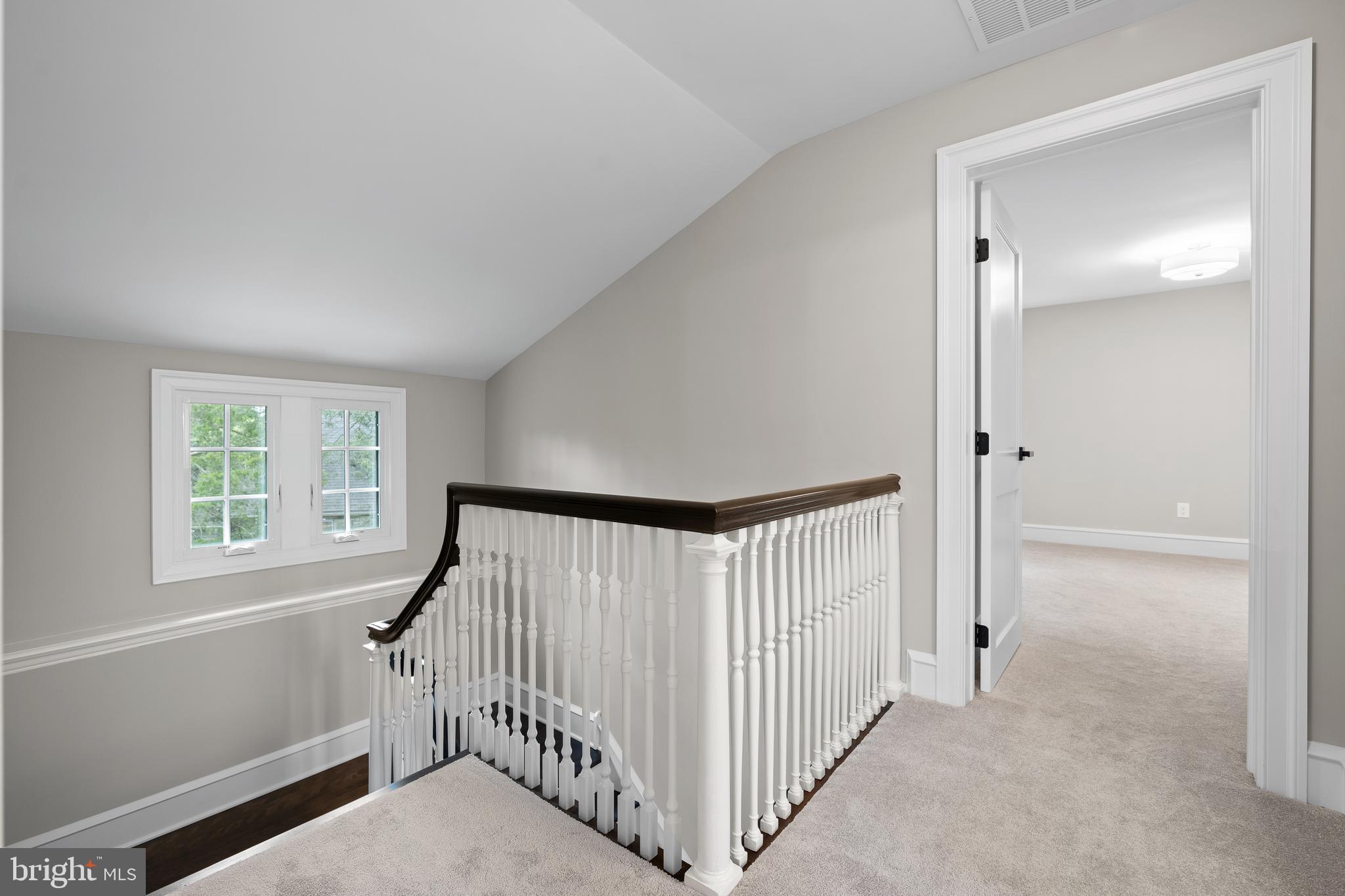 200 Hilldale Road, Unit 1 Villanova, PA 19085 - Photo 45 of 58 a view of a hallway with a window and stairs