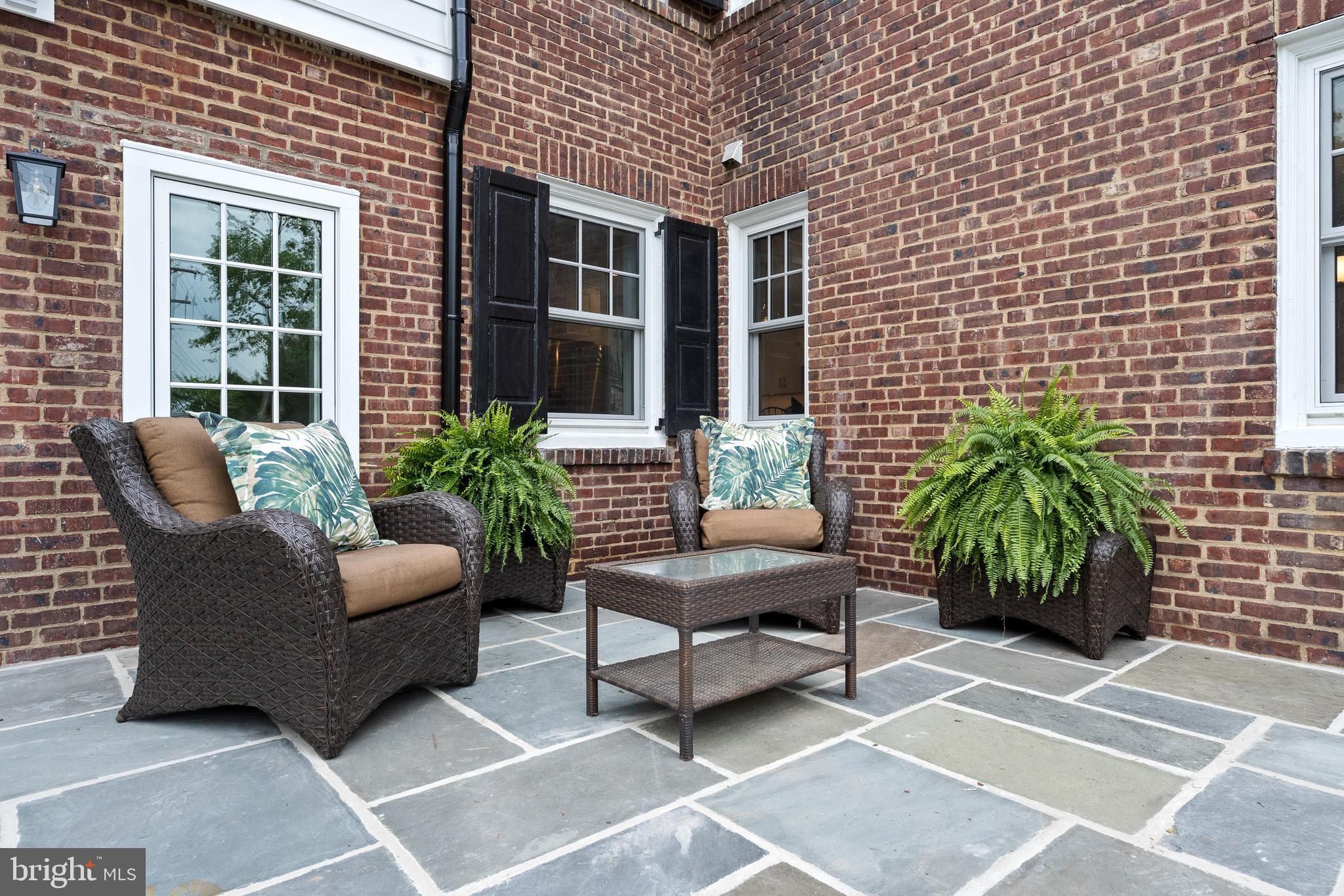 200 Hilldale Road, Unit 1 Villanova, PA 19085 - Photo 55 of 58 a view of a patio with couches and potted plants