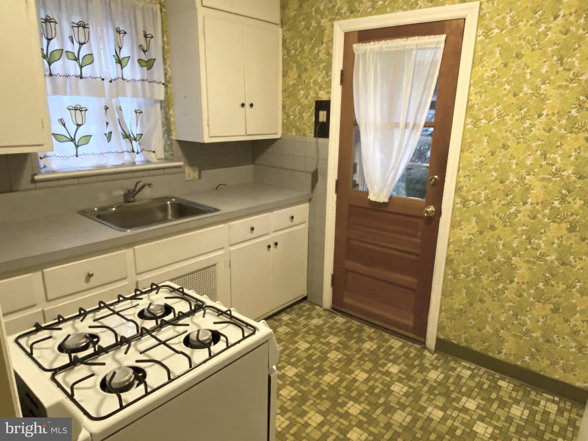 38 Congress Avenue Springfield, PA 19064 - Photo 8 of 24 a view of kitchen with wooden floor