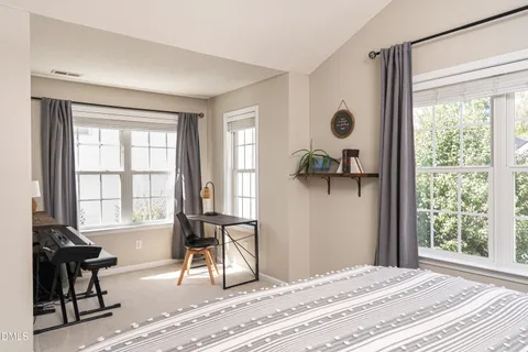a bathroom with a bathtub a sink and a mirror