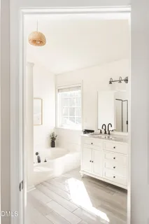 a view of a chair and tables front of the house