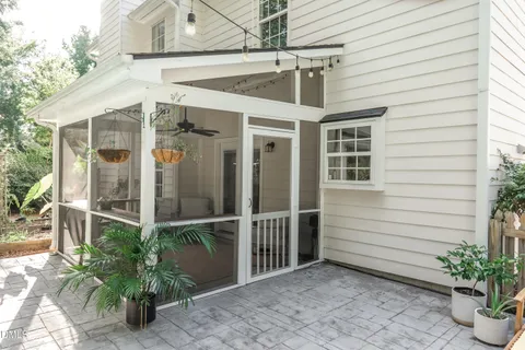 an aerial view of a house with outdoor space and street view
