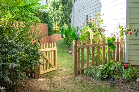 a view of a yard in front view of a house