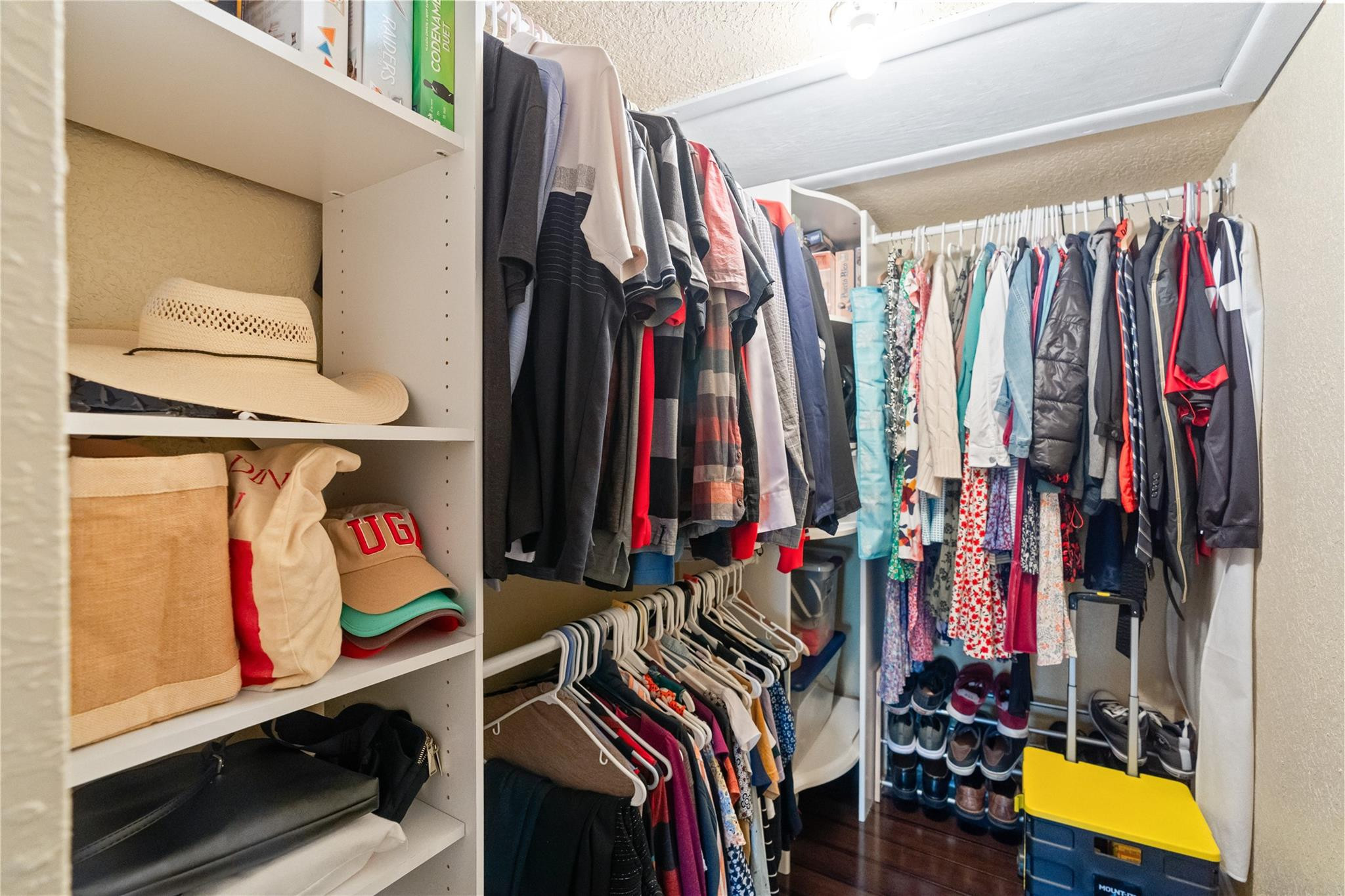 2061 Southwest 90th Avenue, Unit B17 Davie, FL 33324 - Photo 20 of 38 a view of walk in closet with clothes