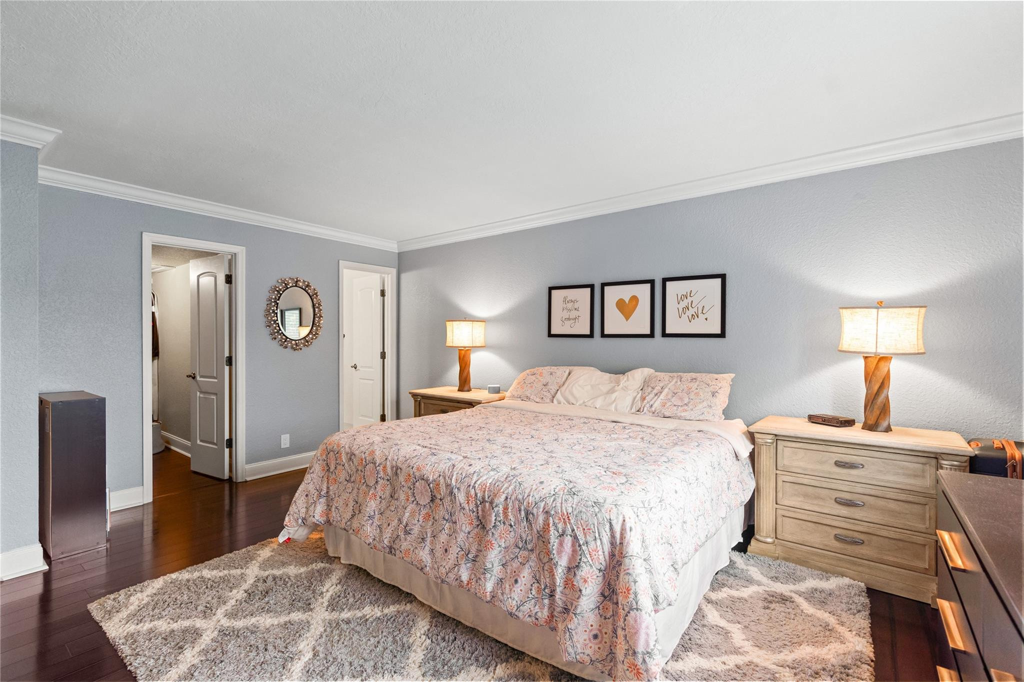 2061 Southwest 90th Avenue, Unit B17 Davie, FL 33324 - Photo 24 of 38 a bedroom with a large bed and a chandelier