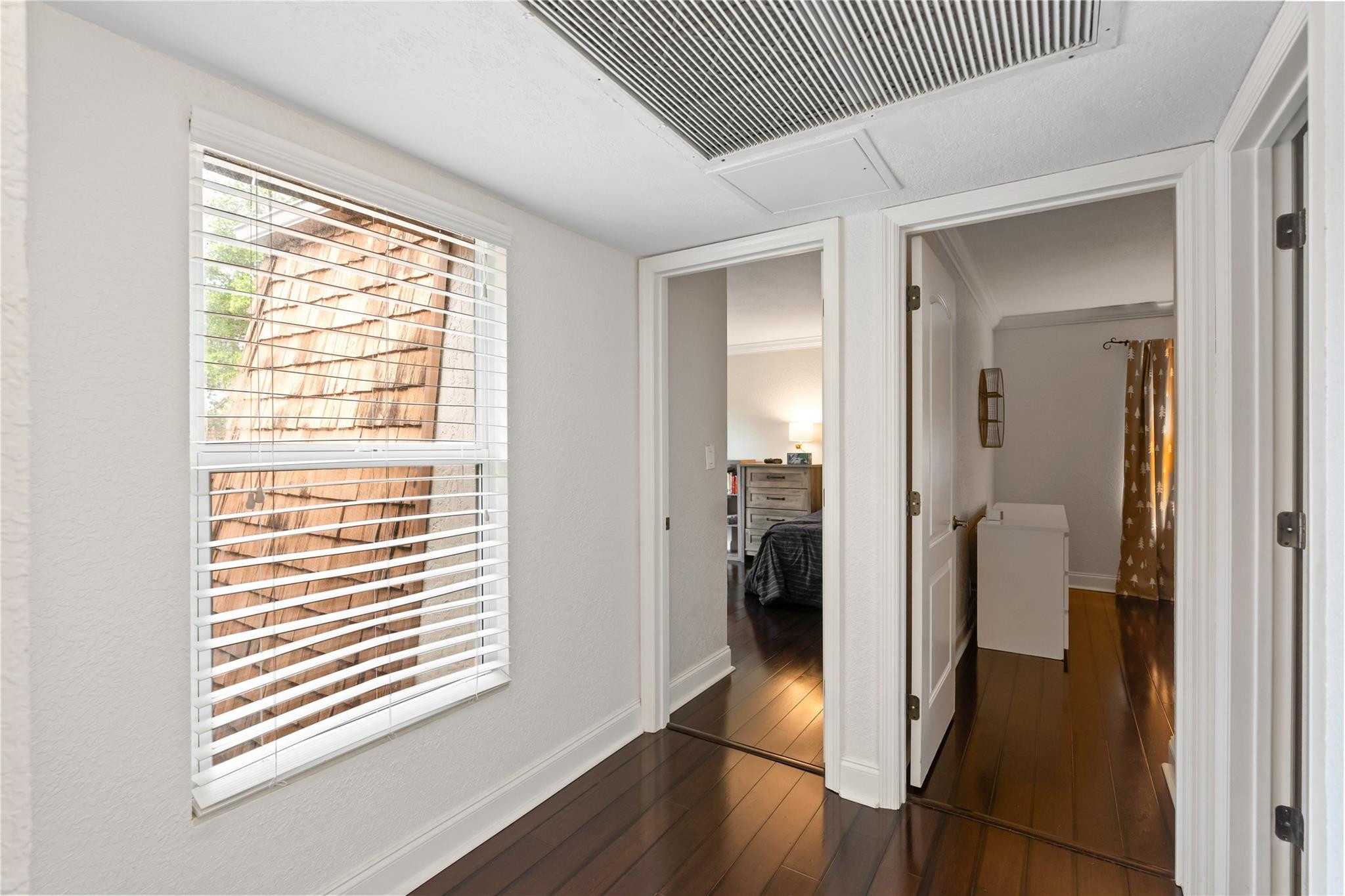 2061 Southwest 90th Avenue, Unit B17 Davie, FL 33324 - Photo 25 of 38 a view of a hallway with wooden floor and a bathroom
