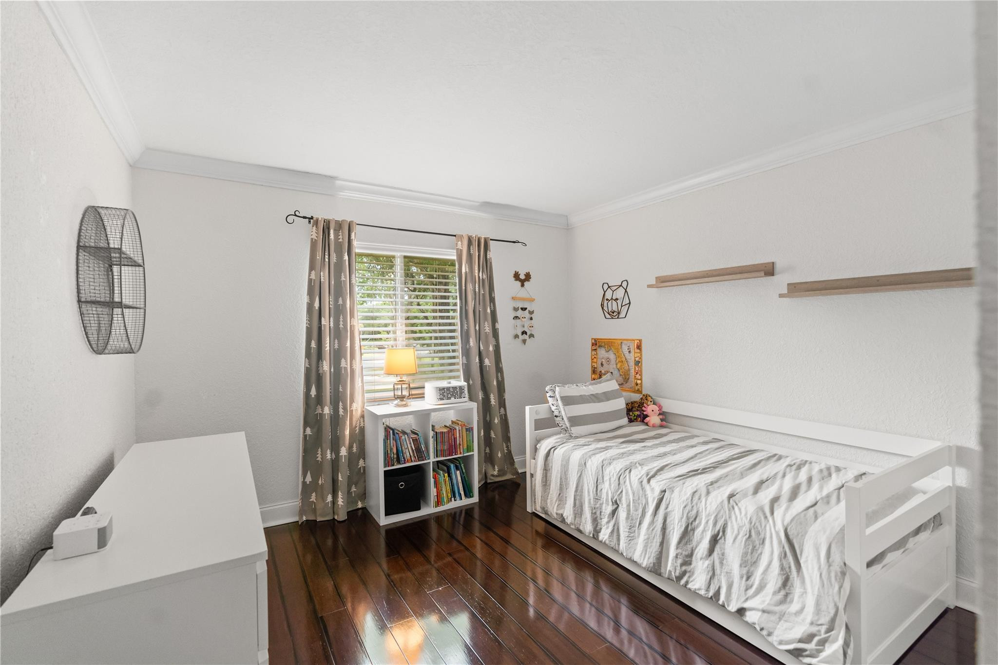 2061 Southwest 90th Avenue, Unit B17 Davie, FL 33324 - Photo 30 of 38 a bedroom with a bed and a window