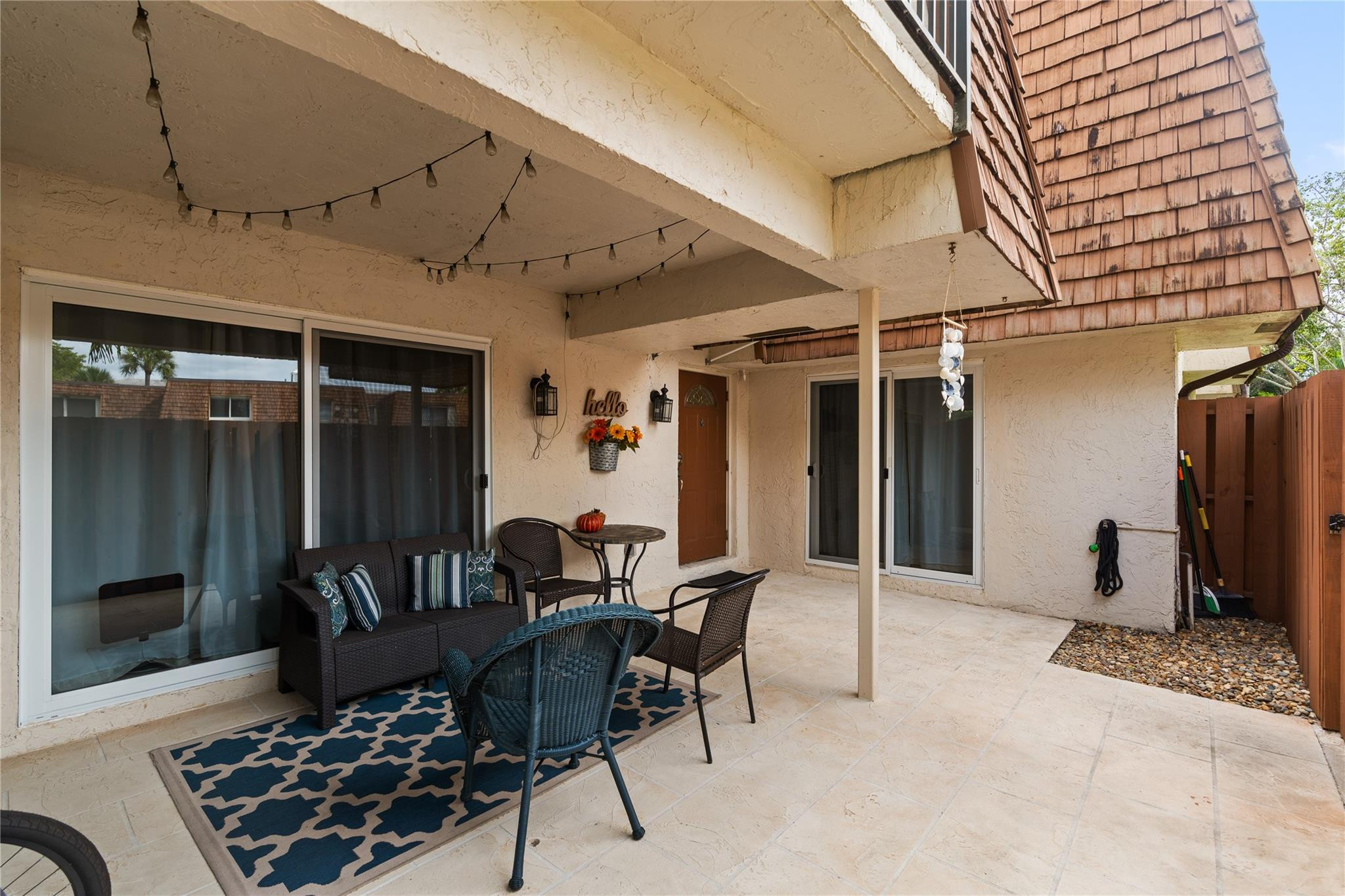 2061 Southwest 90th Avenue, Unit B17 Davie, FL 33324 - Photo 3 of 38 a outdoor space with lots of furniture and shower
