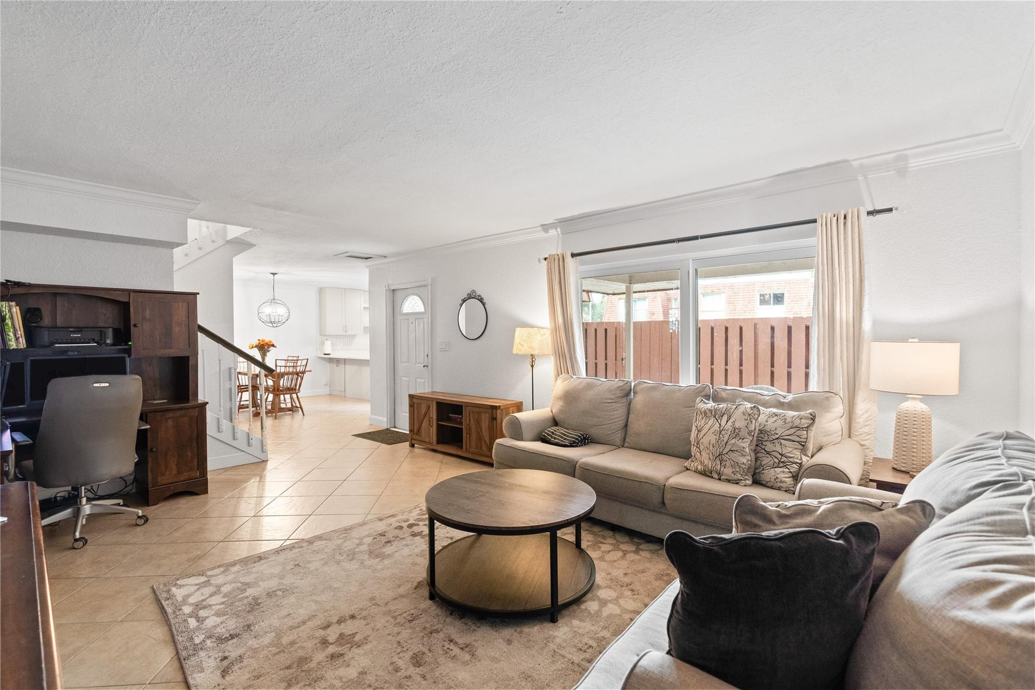 2061 Southwest 90th Avenue, Unit B17 Davie, FL 33324 - Photo 7 of 38 a living room with furniture and a large window