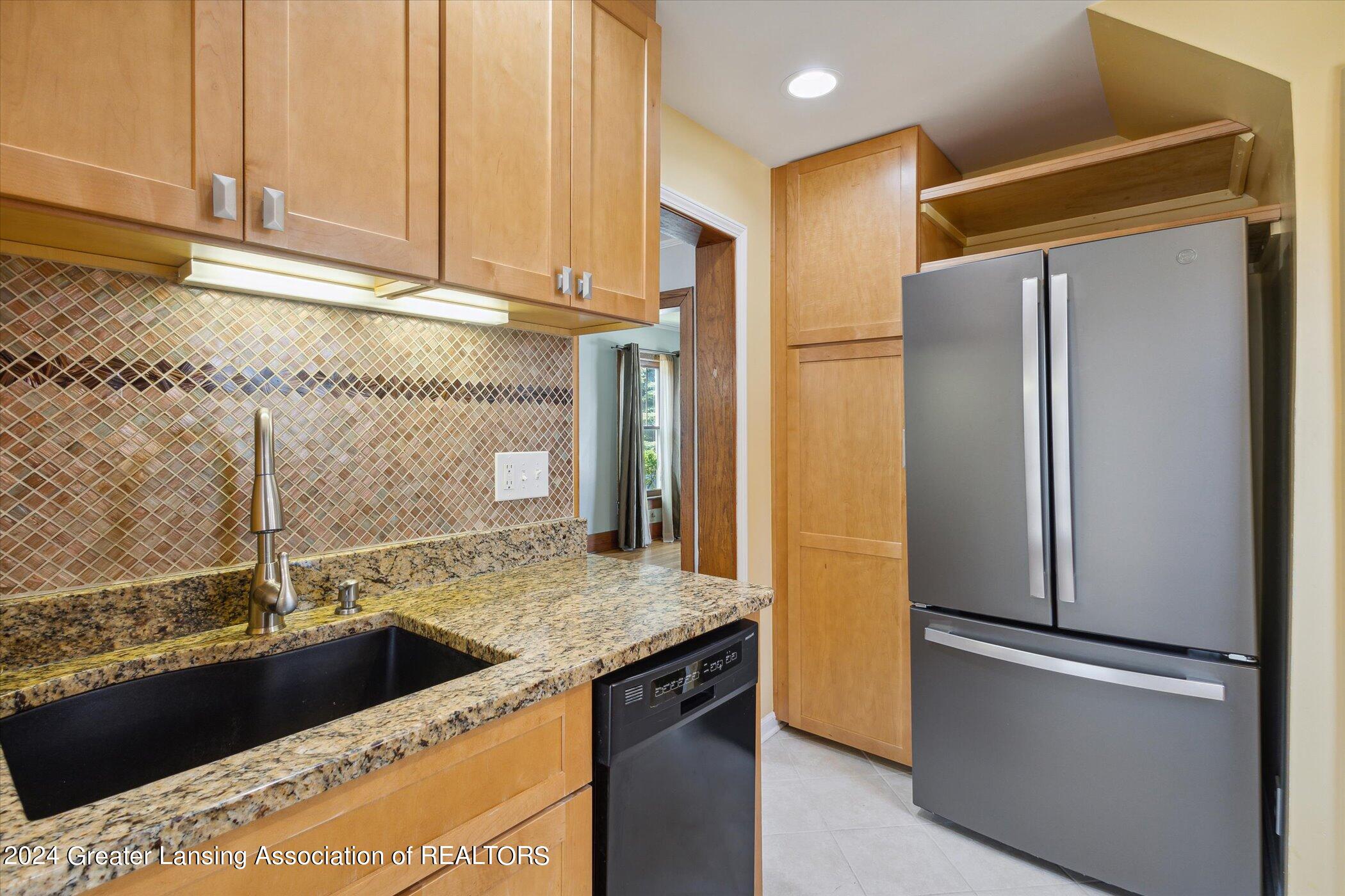 2409 Kensington Road Lansing, MI 48910 - Photo 14 of 35 16-2409-Kensington-Rd-Lansing-MI-48910-W