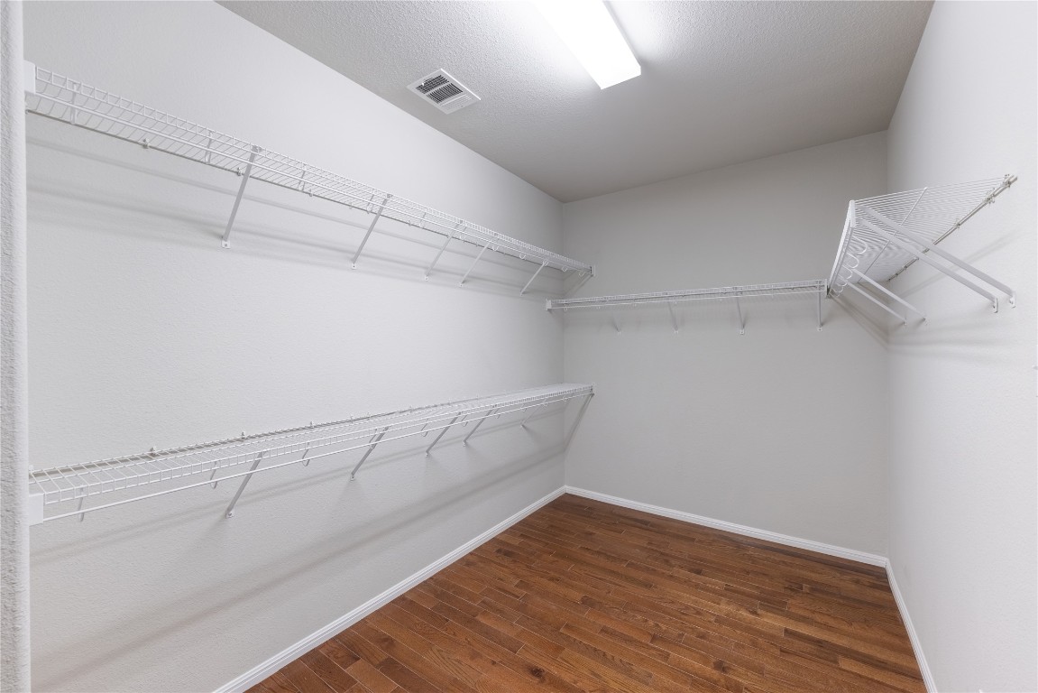 12017 Lansdowne Road Austin, TX 78754 - Photo 15 of 30 a view of a room with racks on the wall