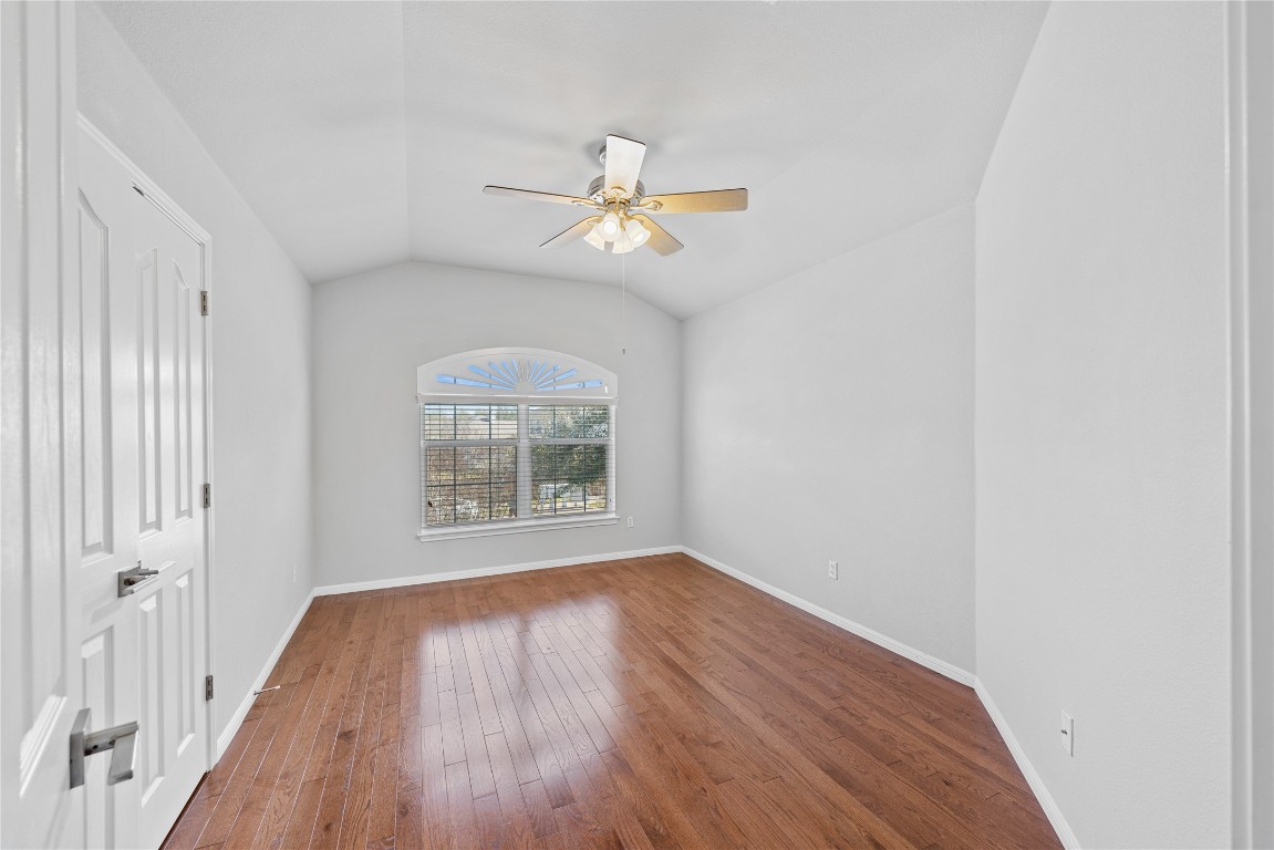12017 Lansdowne Road Austin, TX 78754 - Photo 20 of 30 wooden floor in an empty room with a window