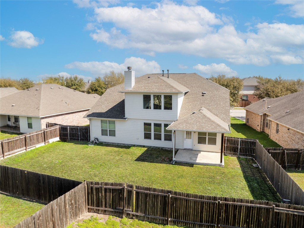 12017 Lansdowne Road Austin, TX 78754 - Photo 30 of 30 a view of a house with wooden deck and a big yard