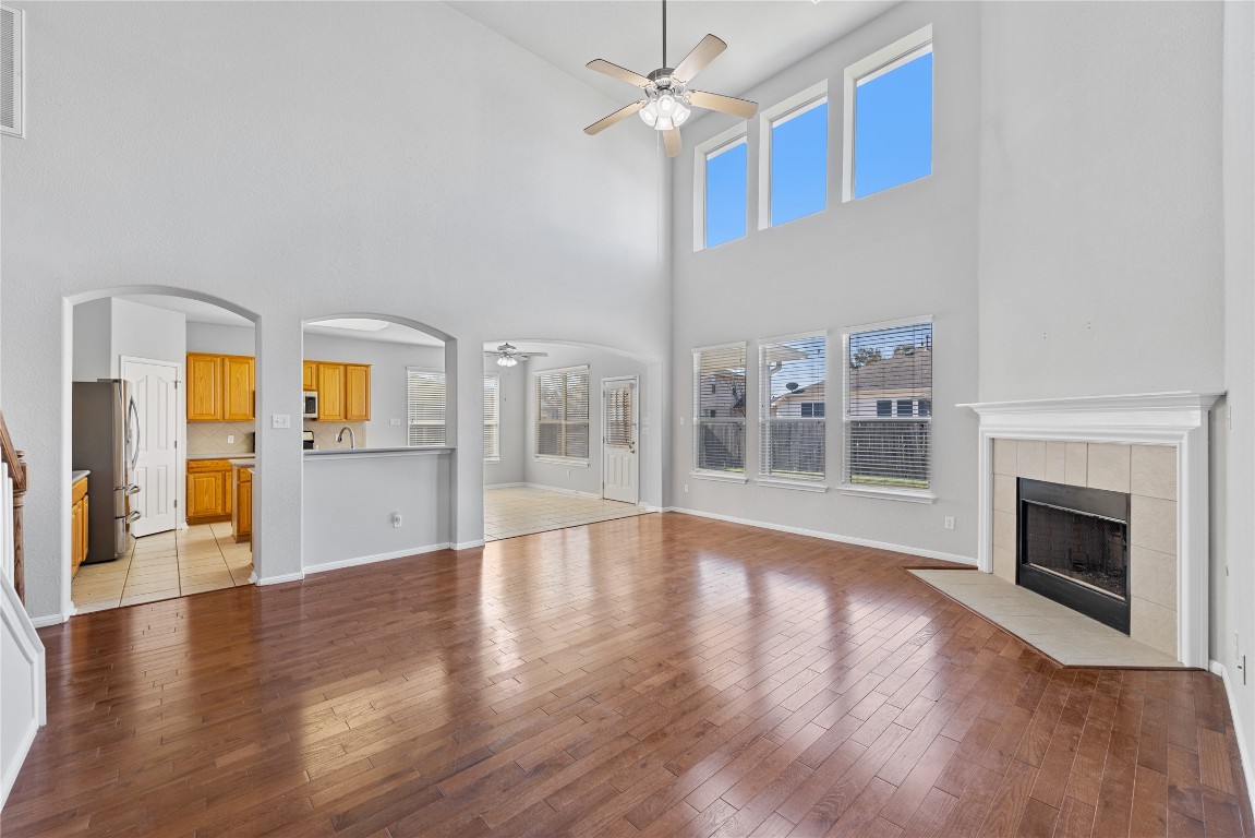 12017 Lansdowne Road Austin, TX 78754 - Photo 5 of 30 a view of an empty room with window and wooden floor