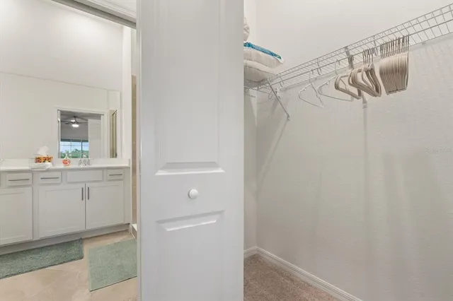 a bathroom with a shower and a sink