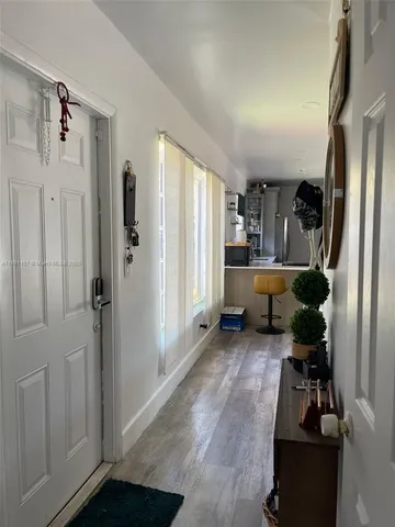 a view of a livingroom with furniture and storage