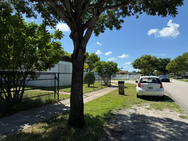 a view of a garden with patio
