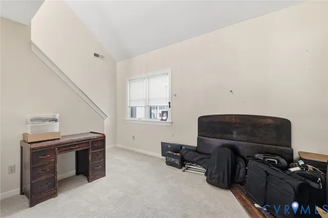 a view of room with window and cabinet