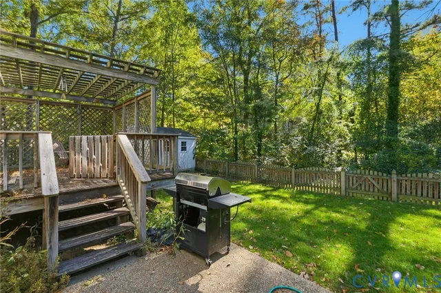 a house view with a backyard space