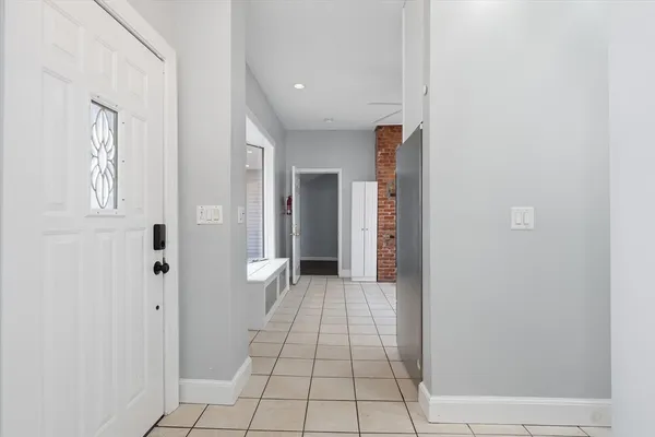 en empty room with wooden floor