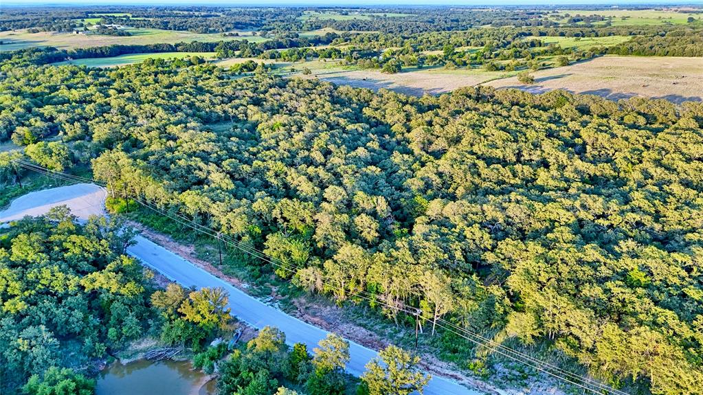 Lot 34 Red Oak Hills Road Nocona, TX 76255 - Photo 3 of 24 a view of a lake with a city view