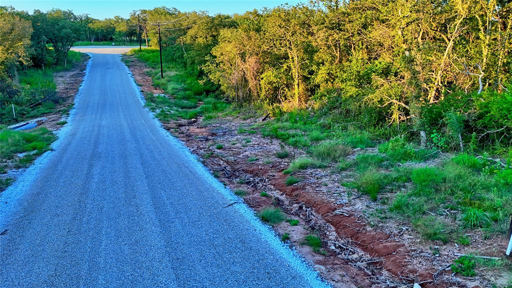 Lot 34 Red Oak Hills Road Nocona, TX 76255 - Photo 4 of 24 a view of street with a yard