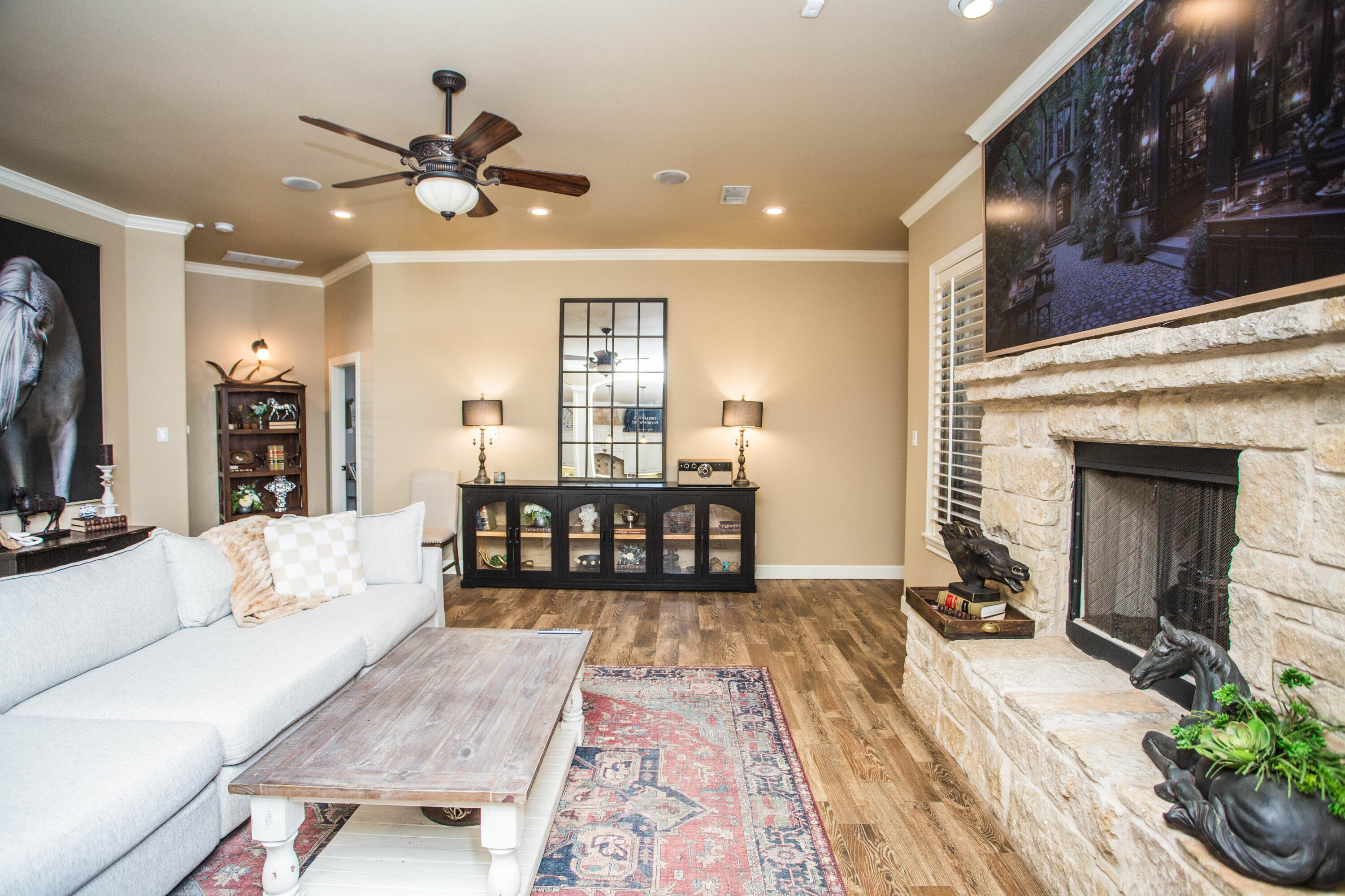 6018 87th Street Lubbock, TX 79424 - Photo 14 of 98 a living room with furniture and a fireplace