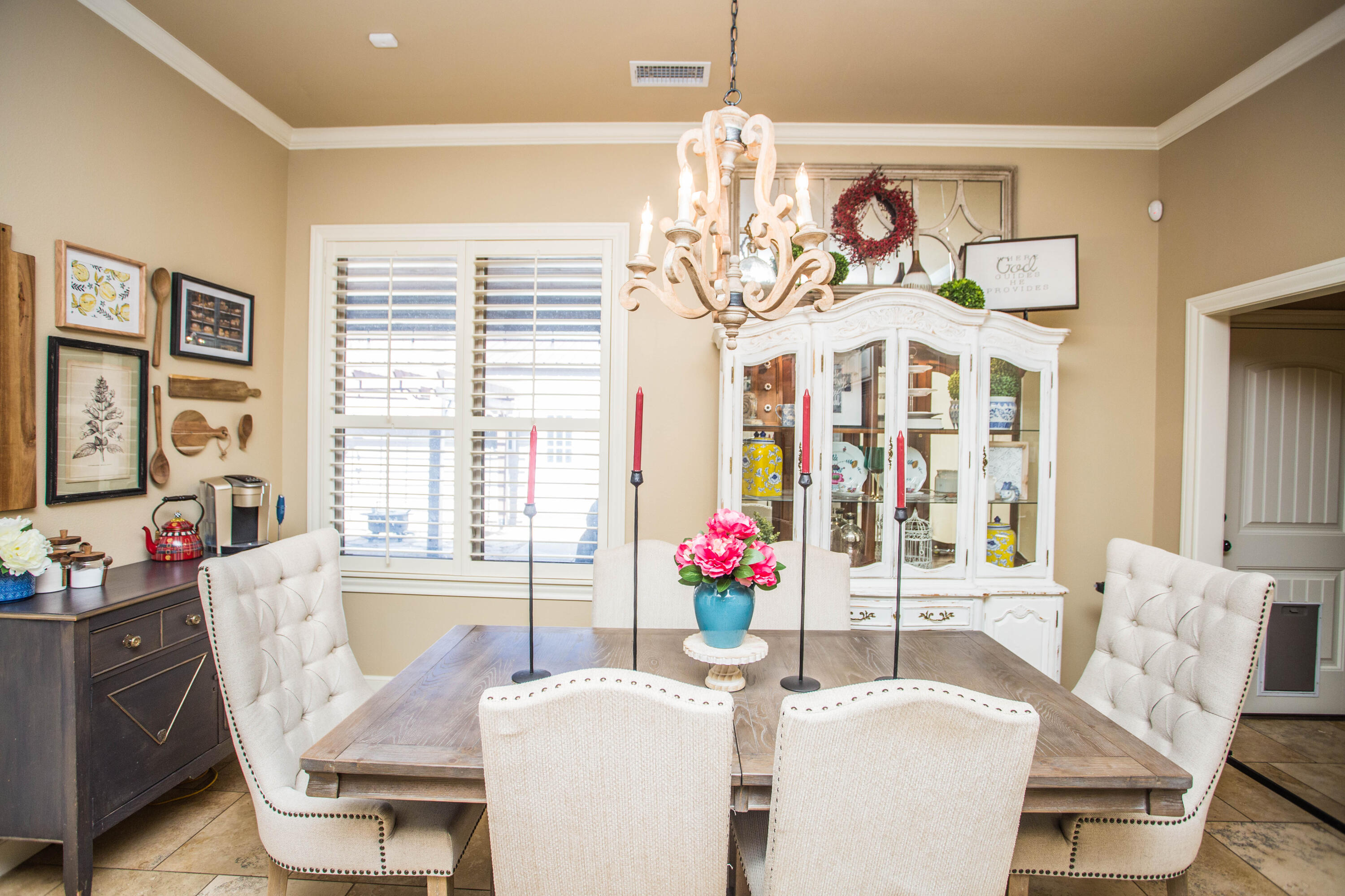 6018 87th Street Lubbock, TX 79424 - Photo 23 of 98 a view of a dining room with furniture large window and wooden floor