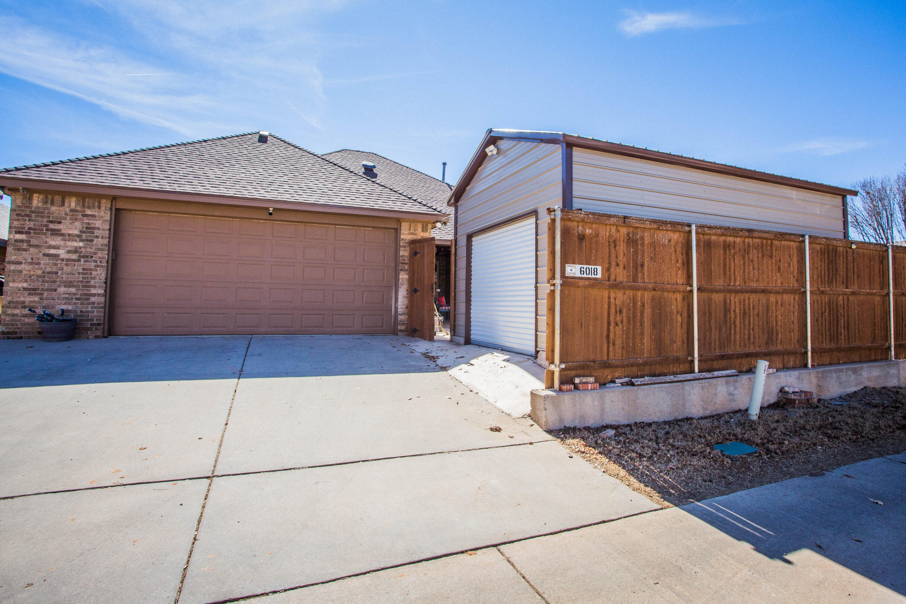 6018 87th Street Lubbock, TX 79424 - Photo 88 of 98 a view of a house with a garage