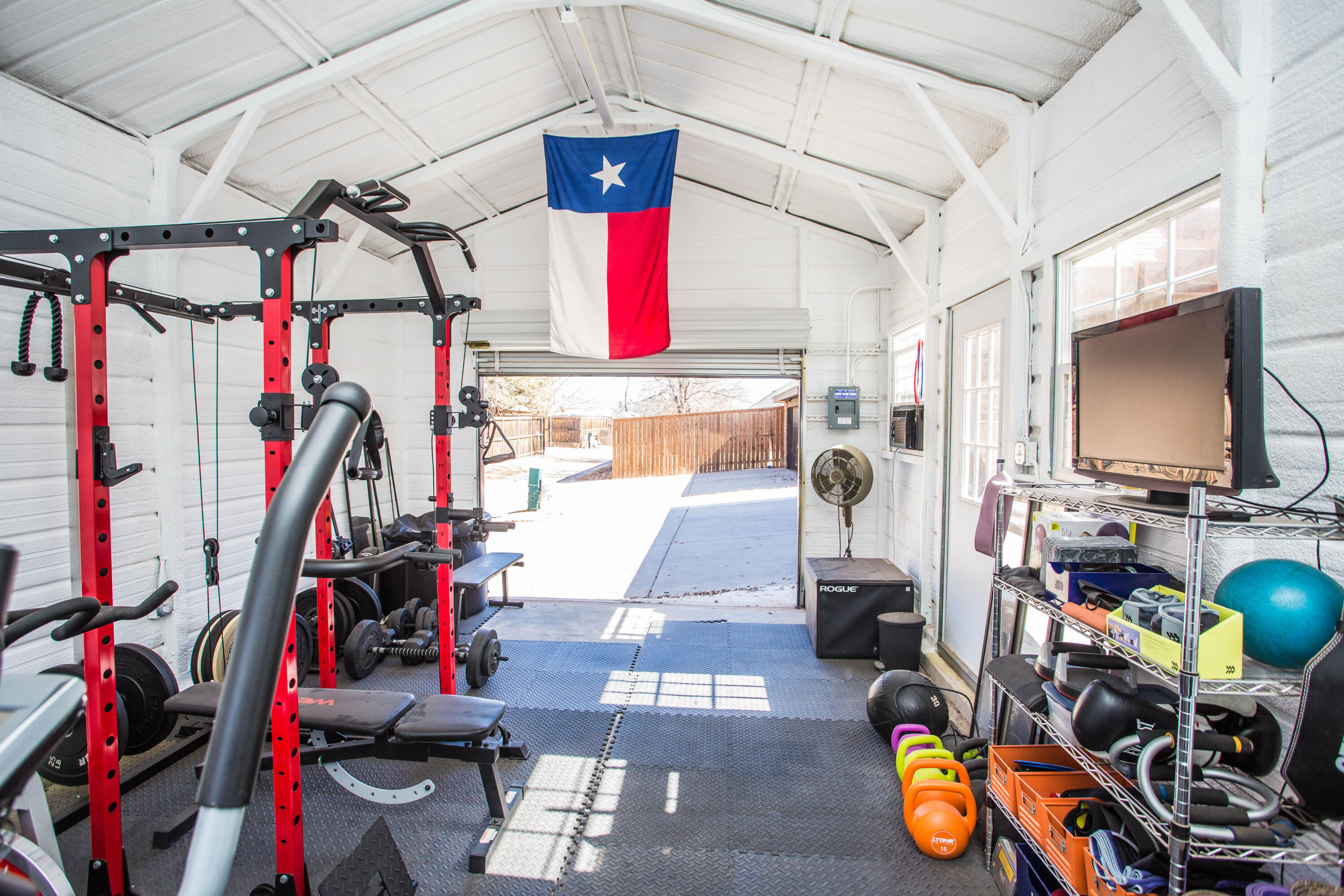 6018 87th Street Lubbock, TX 79424 - Photo 92 of 98 a view of a room with gym equipment