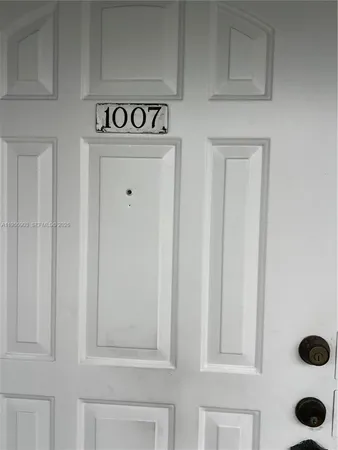 a view of a door and an entryway