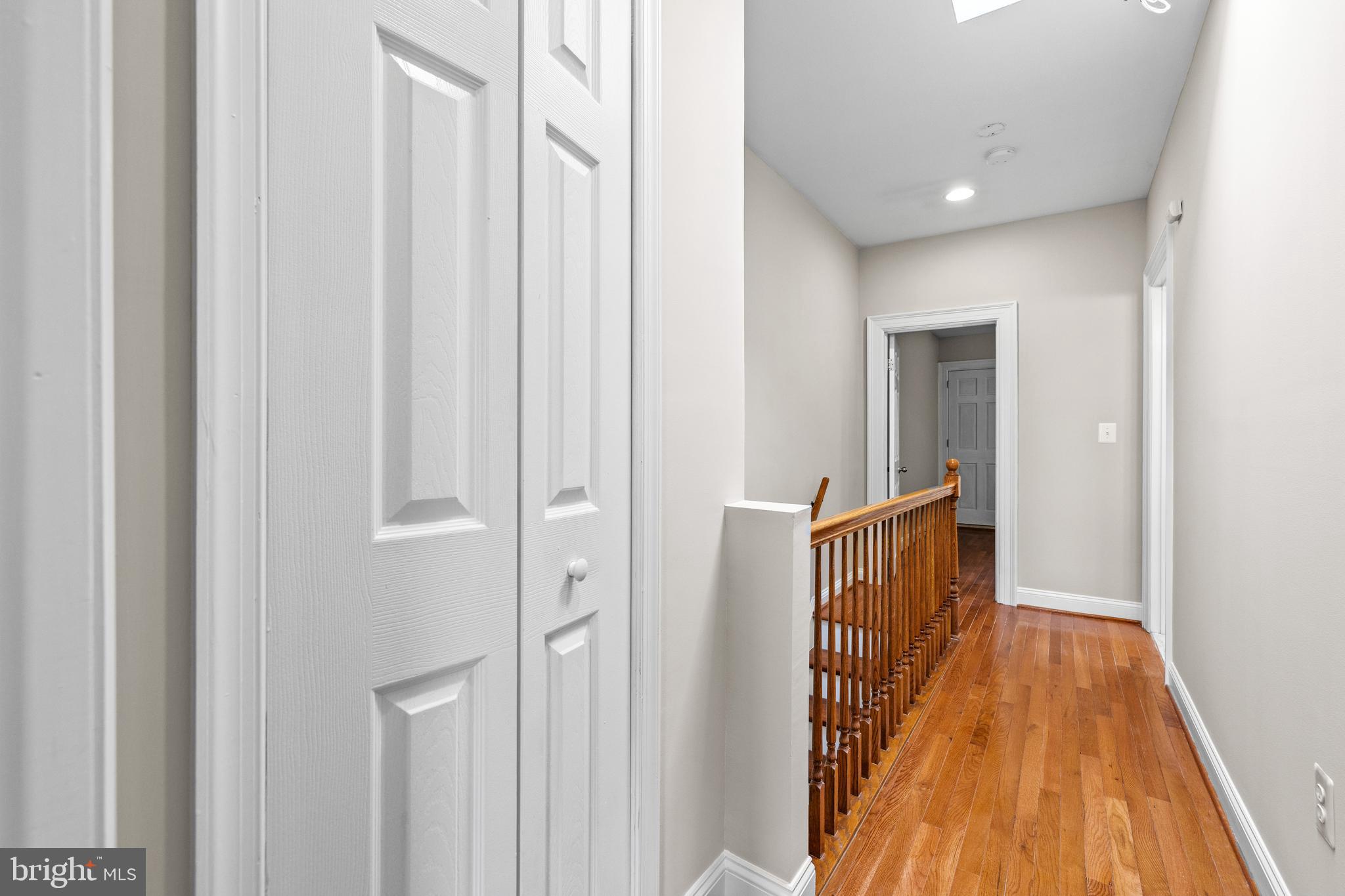 3702 Foster Avenue Baltimore, MD 21224 - Photo 16 of 39 a view of a hallway with wooden floor