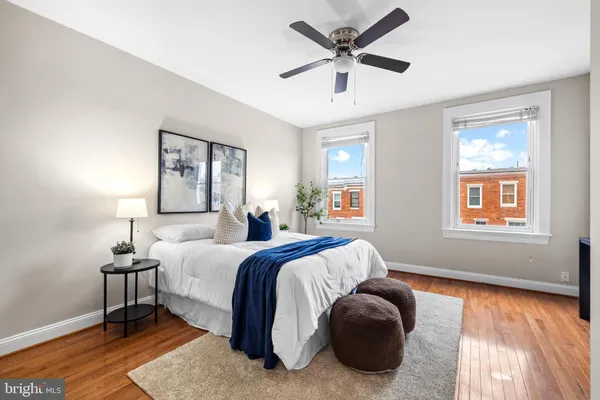a bed room with a bed and a chandelier