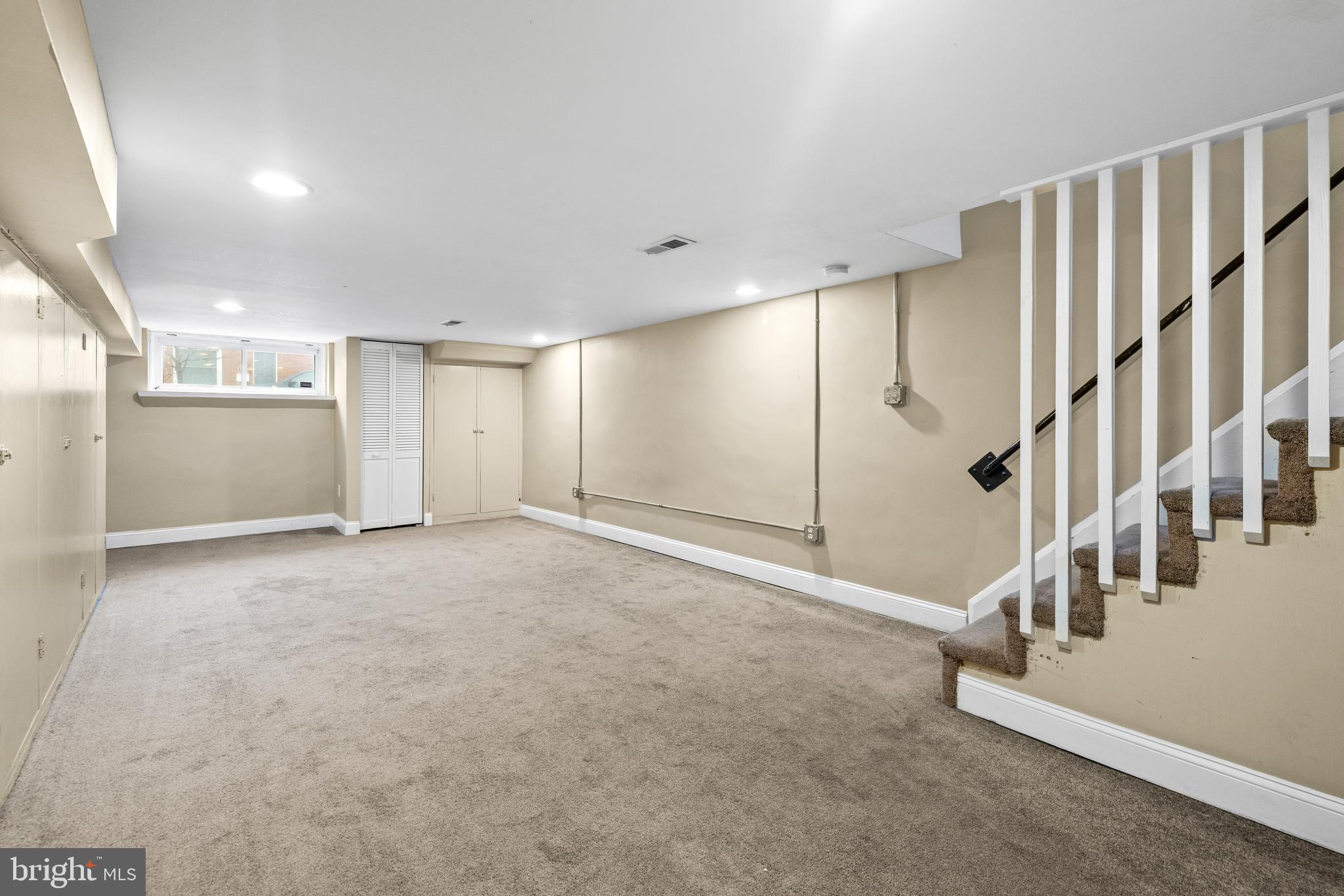 3702 Foster Avenue Baltimore, MD 21224 - Photo 27 of 39 a view of an empty room with stairs