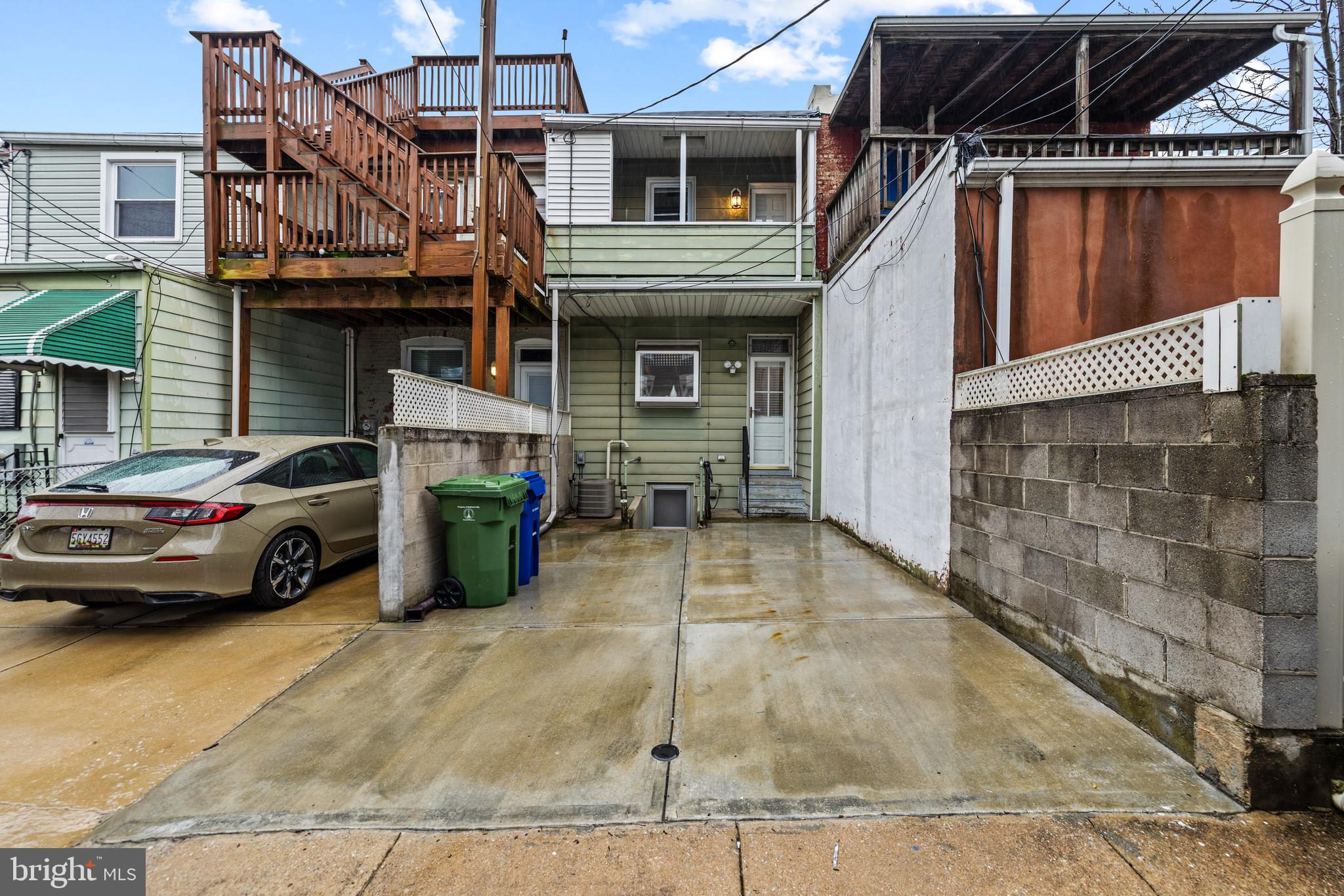 3702 Foster Avenue Baltimore, MD 21224 - Photo 31 of 39 a view of a car park in front of house