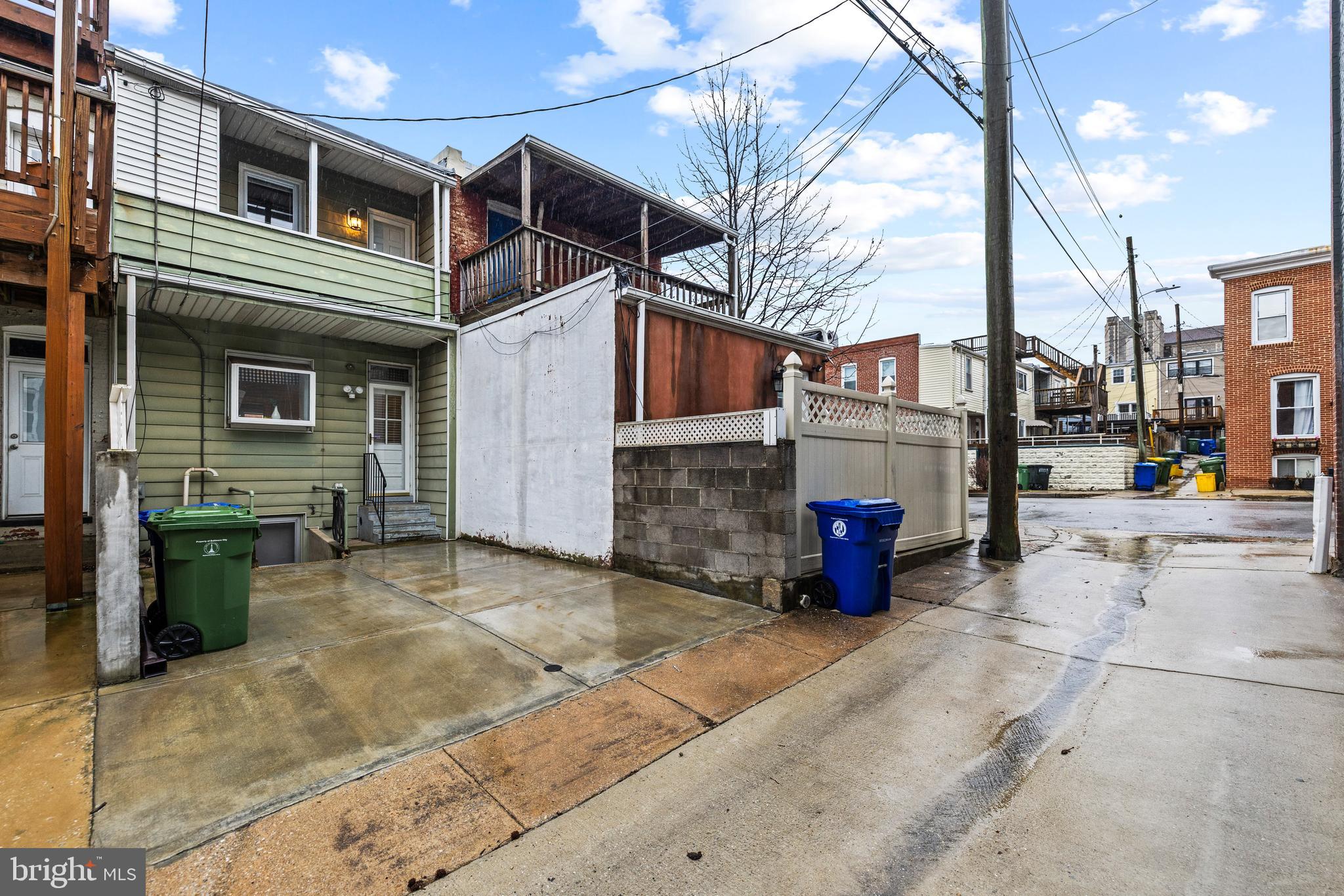 3702 Foster Avenue Baltimore, MD 21224 - Photo 32 of 39 a view of a street with parking
