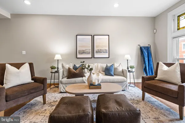 a living room with furniture and a couch