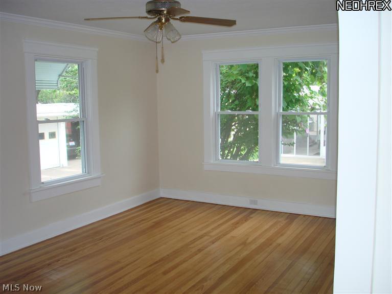1674 Sunview Road Lyndhurst, OH 44124 - Photo 9 of 23 Diningroom has newer windows, ceiling fan, fresh paint and hardwood floor