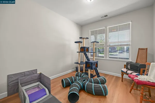 a room with furniture and a window