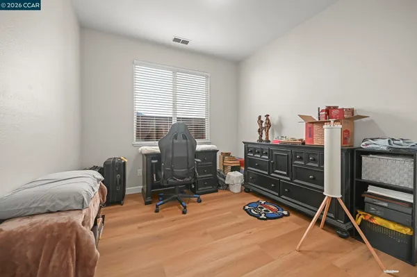 a room with furniture and gym equipment